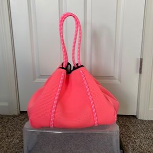 Pop up neon coral bag . Brand new with original bag .